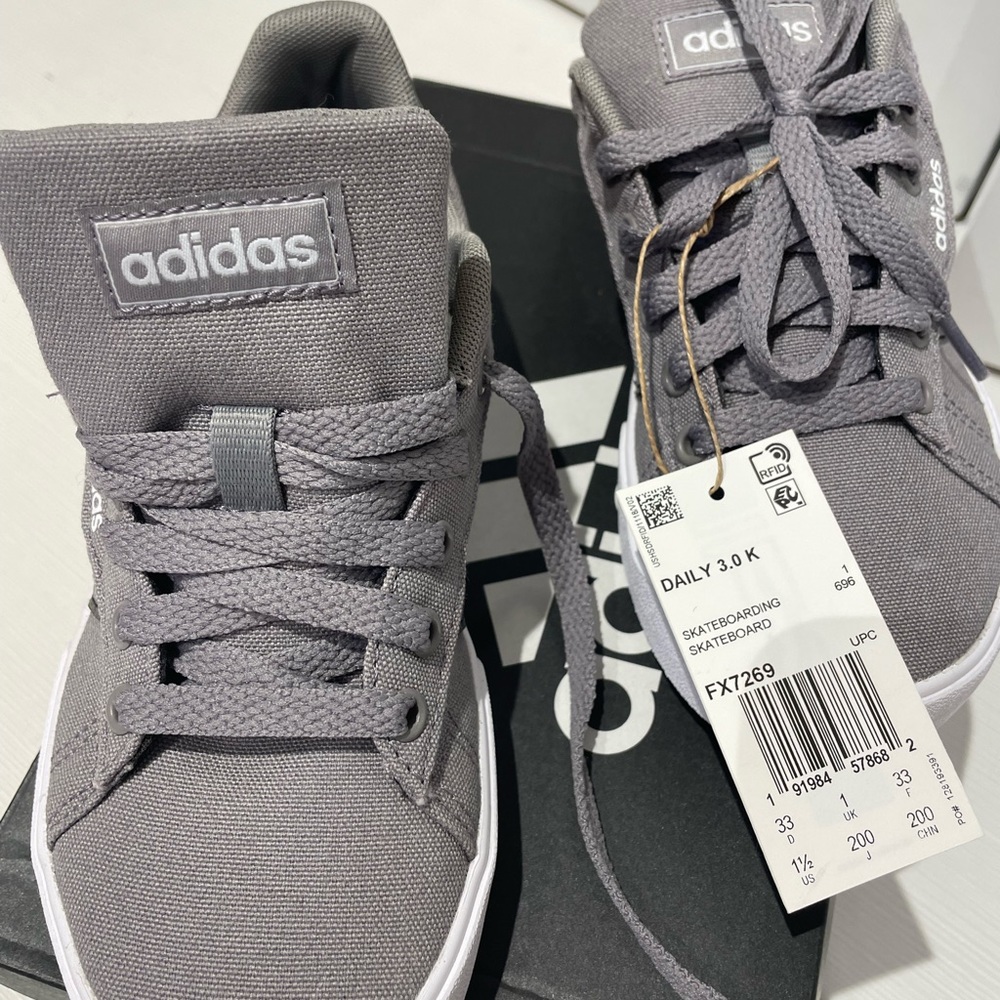 Brand new Adidas daily skate board sneaker color is dove gray